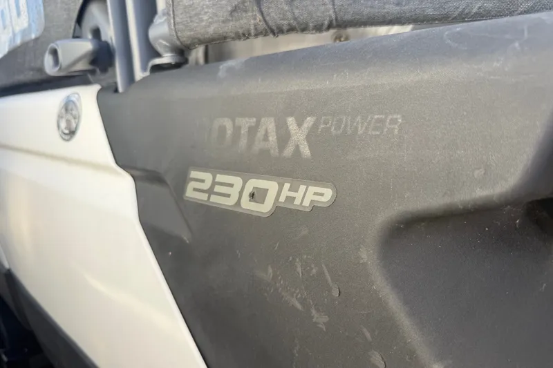 Slide: The Image of Close-up of 2023 Sea-Doo Switch Cruise 21 engine, featuring 230 HP Rotax power. - 8