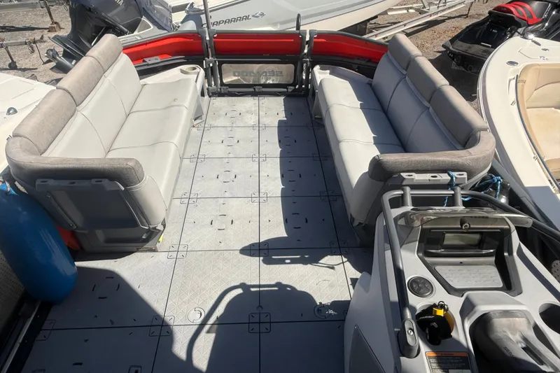 Slide: The Image of 2023 Sea-Doo Switch Cruise 21 interior with spacious seating and modern dashboard. - 15