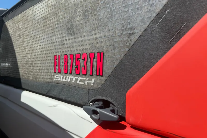 Slide: The Image of 2023 Sea-Doo Switch Cruise 21 with registration FL 8753TN, close-up view. - 10