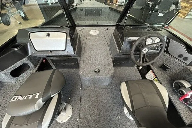 Slide: The Image of Interior of 2027 Lund 1800 Adventure Sport boat with dual seats and steering console. - 7
