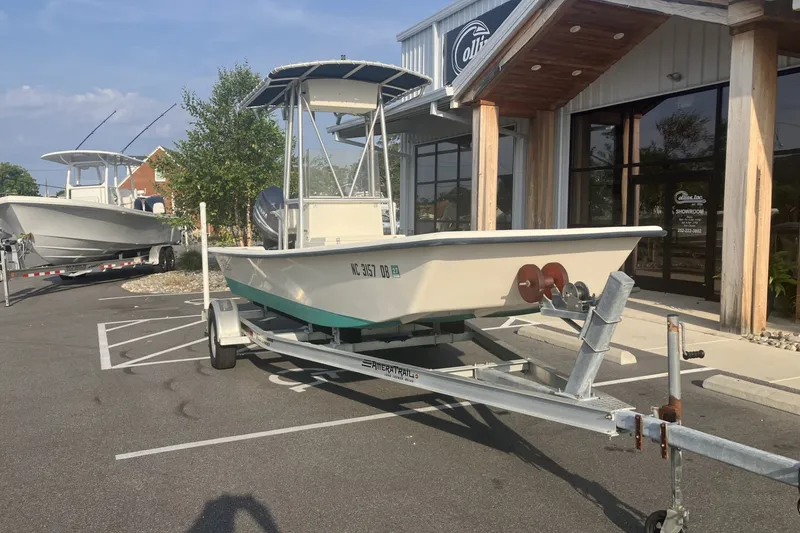 Slide: The Image of Jones Brothers Bateau 19 boat on trailer outside showroom, 2005 model. - 5