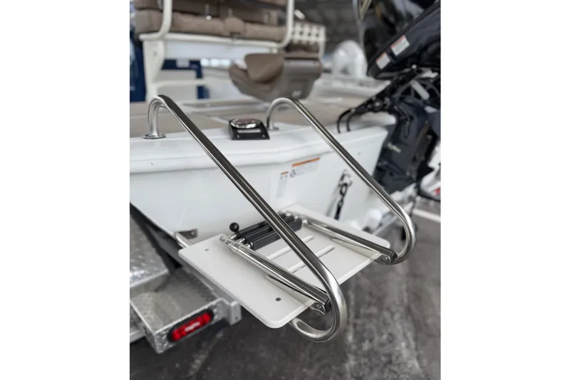 Slide: The Image of Stainless steel ladder on 2027 Avid 21 FSX boat, showcasing rear design and functionality. - 23