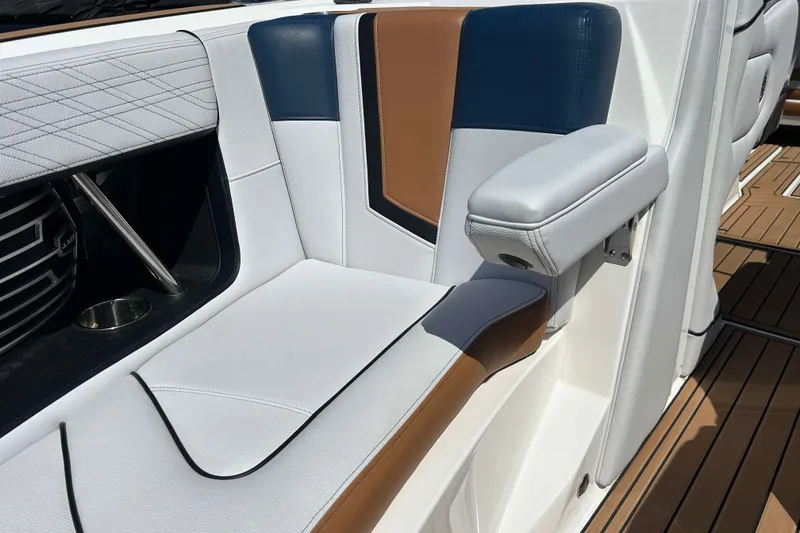 Slide: The Image of 2019 Nautique Super Air Nautique G21 interior with stylish seating and armrest. - 23