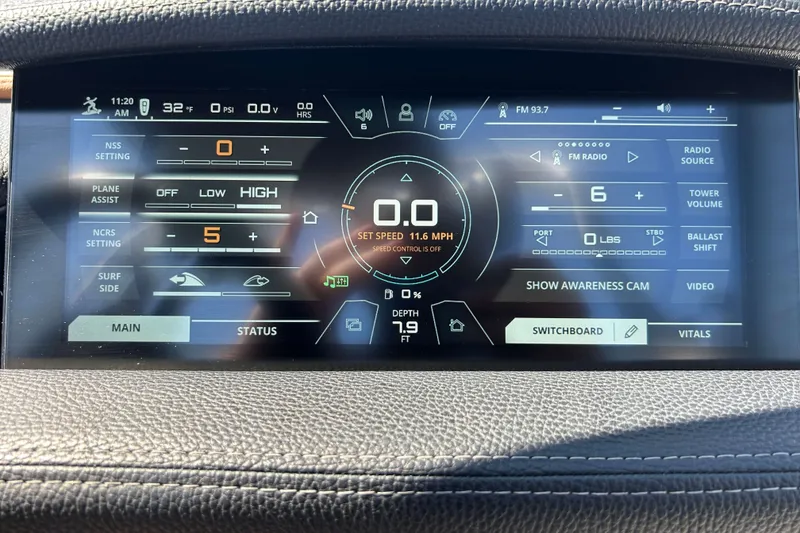 Slide: The Image of Dashboard display of a 2019 Nautique Super Air Nautique G21 boat. - 13