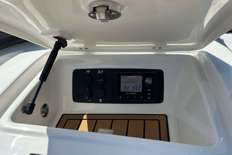 Slide: The Image of 2019 Nautique Super Air Nautique G21 audio system with JL Audio display and USB port. - 14