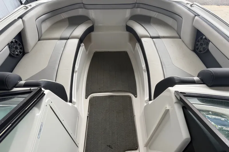 Slide: The Image of Interior view of a 2015 Yamaha Boats 212X, featuring spacious seating and sleek design. - 1