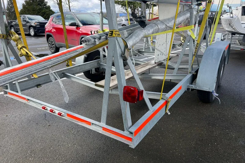 Slide: The Image of Trailer for 2015 Catalina 275 Sport sailboat in parking lot. - 9