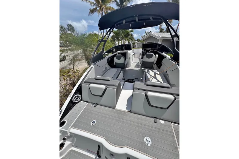 Slide: The Image of 2024 Yamaha Boats AR250 interior with sleek seating and modern design. - 4