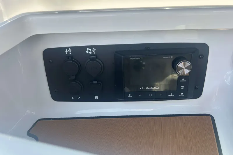 Slide: The Image of JL Audio system in the 2022 Nautique Super Air Nautique G21. - 18