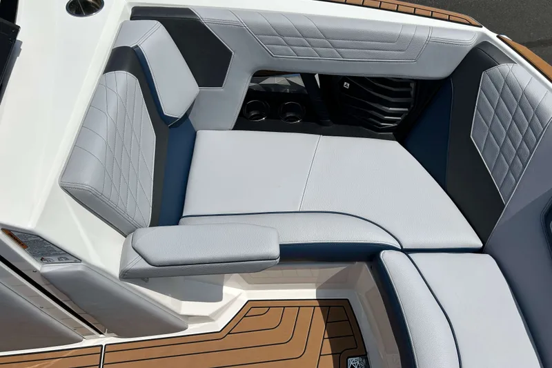 Slide: The Image of Luxurious seating on 2022 Nautique Super Air Nautique G21 boat, featuring elegant upholstery design. - 15