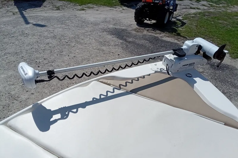 Slide: The Image of 2016 Key West 210 Bay Reef boat with Minn Kota trolling motor on deck. - 19