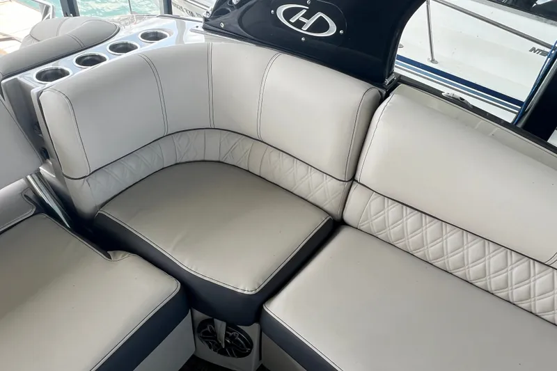 Slide: The Image of Luxurious seating on 2023 Harris Crowne SL 250 boat with quilted upholstery. - 23