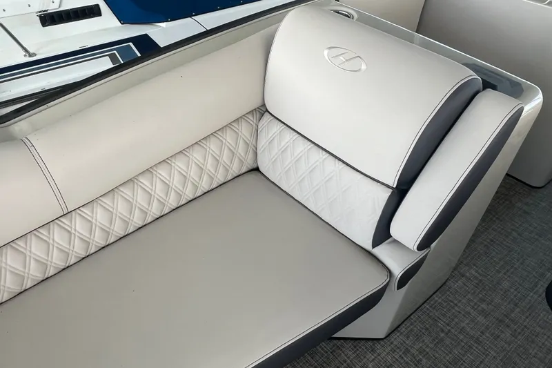 Slide: The Image of Luxurious seating on 2023 Harris Crowne SL 250 boat with elegant diamond stitching. - 22