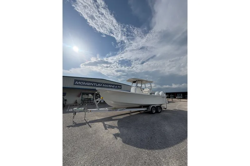 Slide: The Image of 2027 Pair Customs 24 Center Console DV Offshore boat on trailer at Momentum Marine. - 17