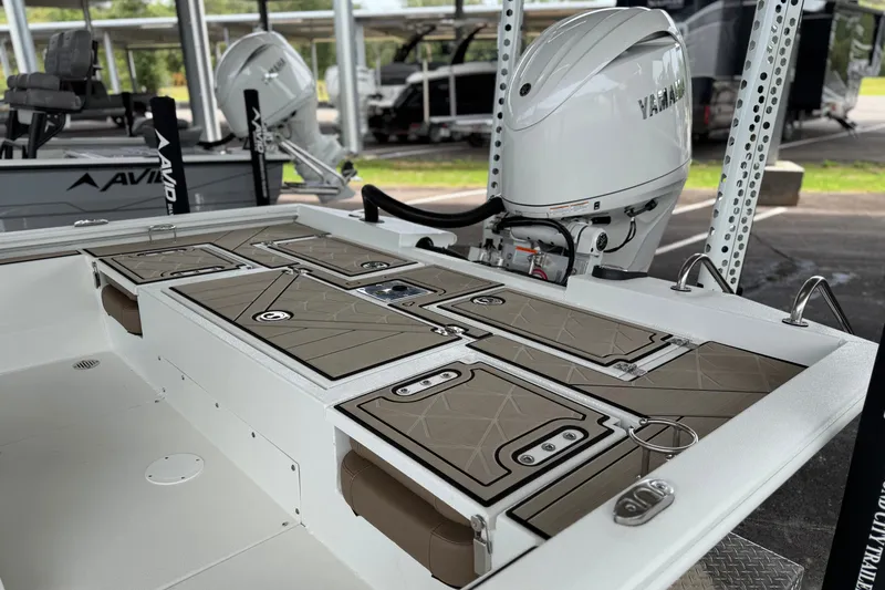 Slide: The Image of Avid 23 Fusion 2027 boat with Yamaha outboard motor, featuring sleek deck design. - 17