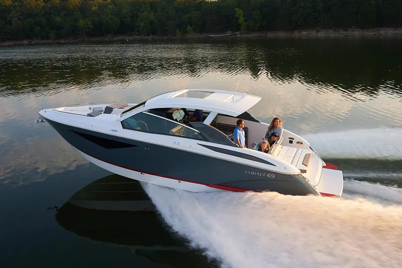 The Image of Manufacturer Provided Image: 2020 Cobalt A36 boat cruising on a lake with passengers. - 0