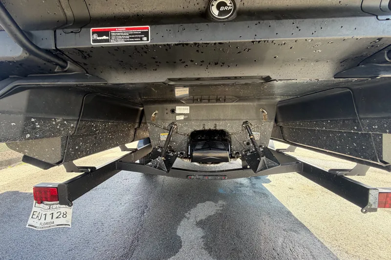 Slide: The Image of Rear view of 2023 Sea-Doo Switch Cruise 21 on trailer, showing hull and license plate. - 4