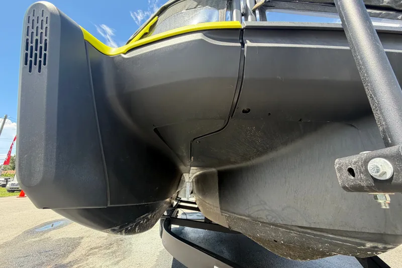 Slide: The Image of 2023 Sea-Doo Switch Cruise 21 pontoon boat underside view, showcasing hull design. - 12