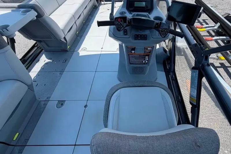 Slide: The Image of 2023 Sea-Doo Switch Cruise 21 interior with seating and control panel. - 6