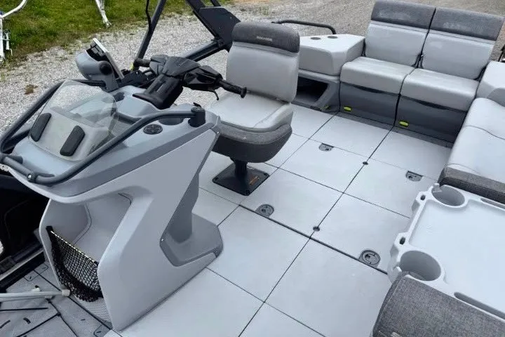 Slide: The Image of 2023 Sea-Doo Switch Cruise 21 interior with spacious seating and modern helm design. - 5