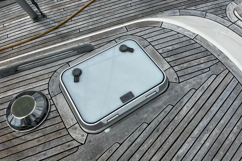 Slide: The Image of Deck of 1997 Hallberg-Rassy 42F yacht with hatch and wooden finish. - 45