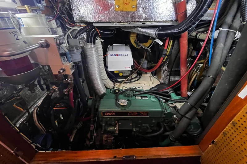 Slide: The Image of Engine room of a 1997 Hallberg-Rassy 42F yacht with Volvo Penta D2-75 engine. - 31