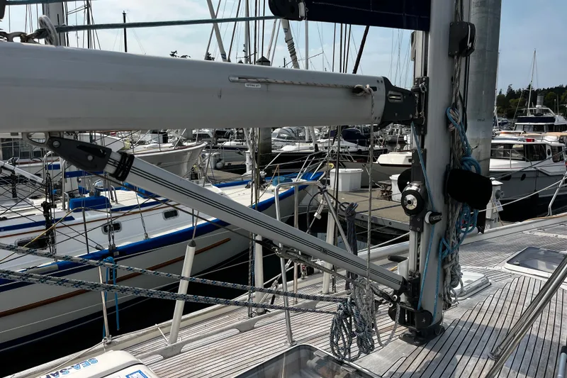 Slide: The Image of Deck view of a 1997 Hallberg-Rassy 42F sailboat in a marina. - 87