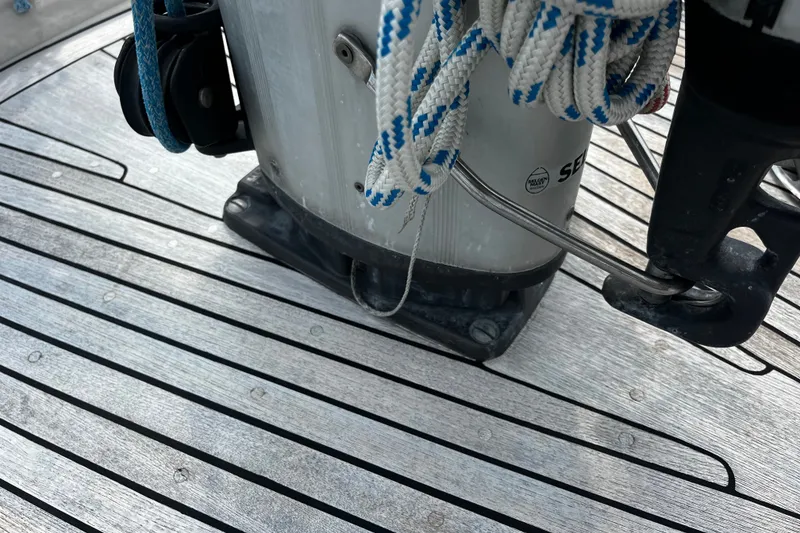 Slide: The Image of Deck of 1997 Hallberg-Rassy 42F sailboat with rigging and ropes. - 44