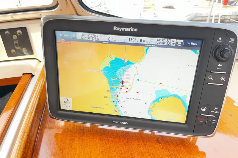 Slide: The Image of Raymarine navigation display on 1997 Hallberg-Rassy 42F yacht, showing Friday Harbor map. - 89