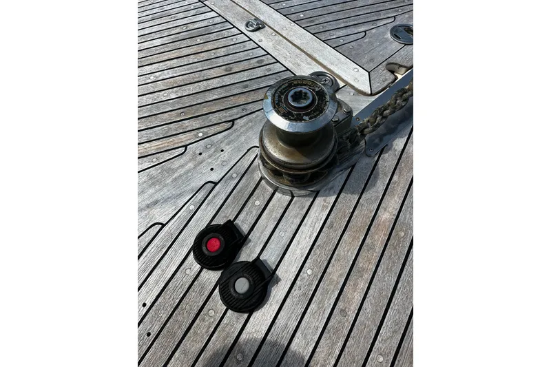 Slide: The Image of Deck of 1997 Hallberg-Rassy 42F yacht with winch and rope details. - 39