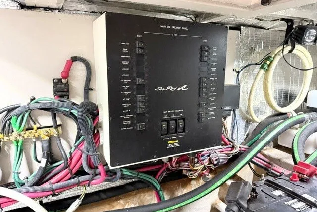 Slide: The Image of Electrical panel of a 2004 Sea Ray 390 Motor Yacht with wiring and components. - 51