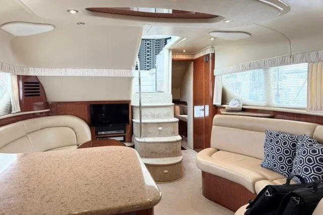 Slide: The Image of Luxurious interior of a 2004 Sea Ray 390 Motor Yacht with elegant seating and modern amenities. - 27