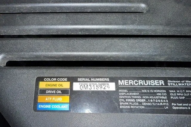 Slide: The Image of Engine compartment label of a 2004 Sea Ray 390 Motor Yacht, showing serial number and fluid color codes. - 56