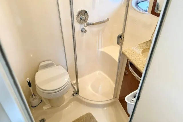 Slide: The Image of Bathroom interior of 2004 Sea Ray 390 Motor Yacht with shower and toilet. - 25
