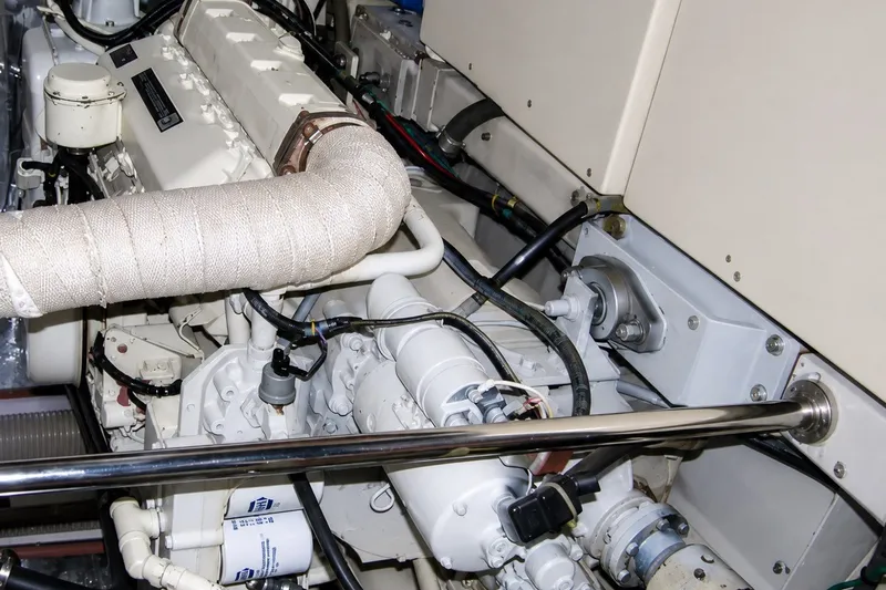 Slide: The Image of Engine compartment of 1988 Angel 45 AFT CABIN MV yacht, showcasing mechanical components. - 28