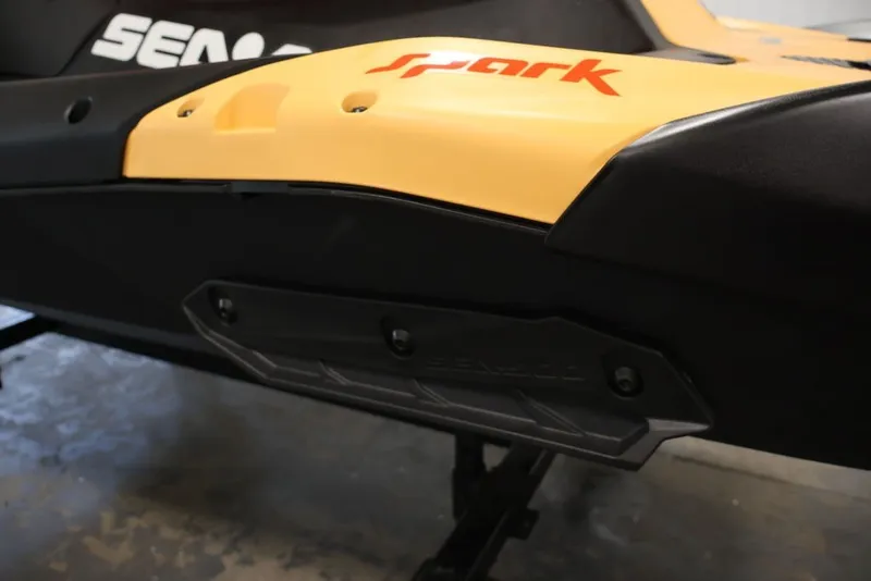 Slide: The Image of 2026 Sea-Doo Spark for 3, close-up of yellow and black body design. - 16