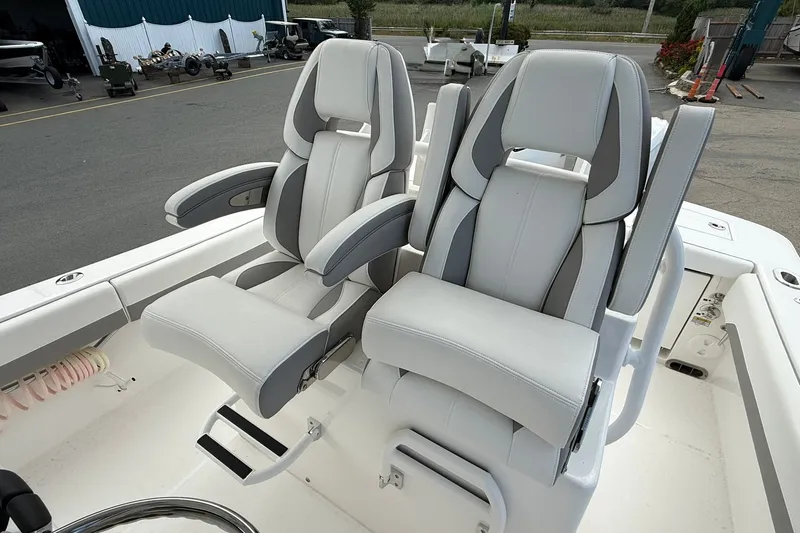 Slide: The Image of Luxury seating on a 2026 Regulator 28 boat, featuring sleek, modern design. - 16