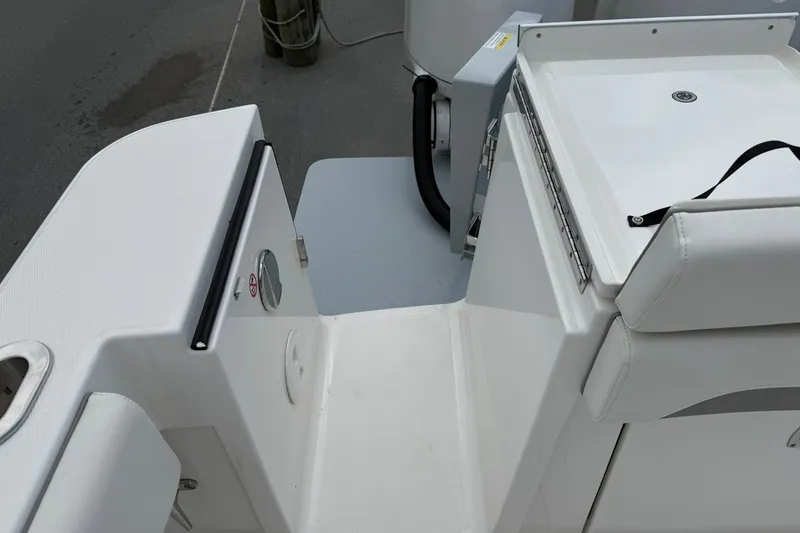 Slide: The Image of 2026 Regulator 28 boat deck, featuring sleek white seating and modern design elements. - 23