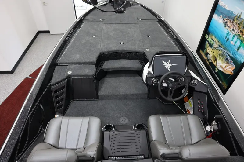 Slide: The Image of 2026 Skeeter ZXR19 SE boat interior with dual seats and modern dashboard. - 4