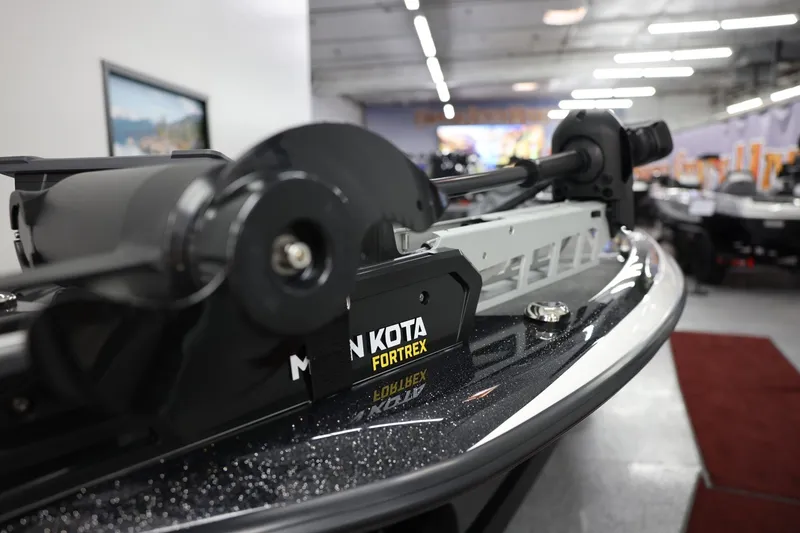 Slide: The Image of Close-up of 2026 Skeeter ZXR19 SE boat with Minn Kota Fortrex motor in showroom. - 9