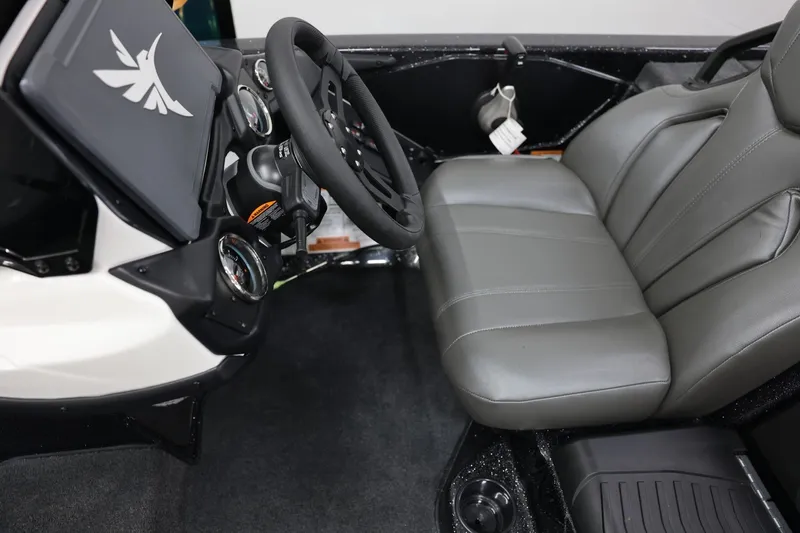 Slide: The Image of Interior of 2026 Skeeter ZXR19 SE boat with steering wheel and gray seating. - 6