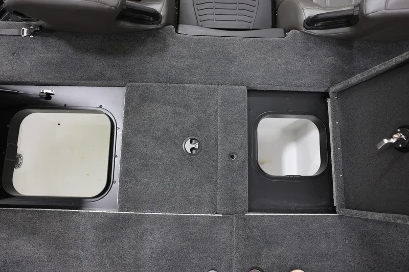 Slide: The Image of Interior view of 2026 Skeeter ZXR19 SE boat with open storage compartments. - 14