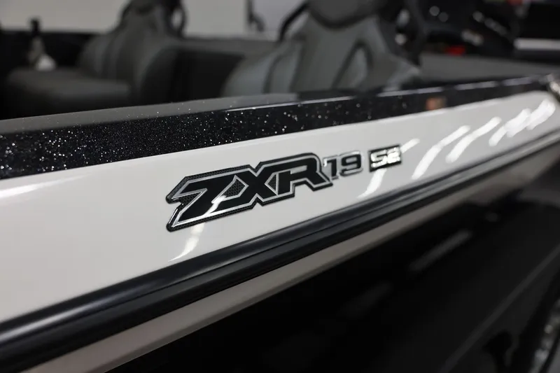 The Image of 2026 Skeeter ZXR19 SE boat logo on sleek white surface. - 0