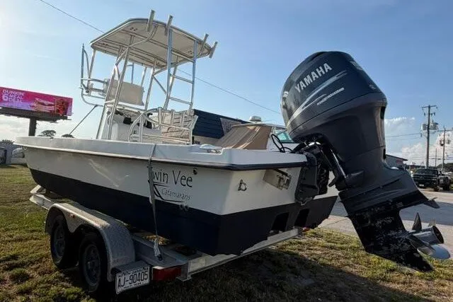 Slide: The Image of 2009 Twin Vee 22 BayCat boat with Yamaha outboard motor on trailer. - 5