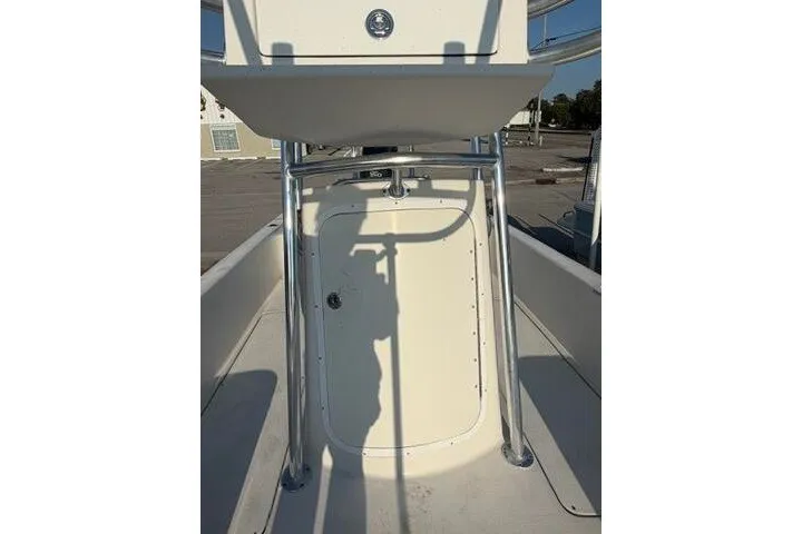 Slide: The Image of 2009 Twin Vee 22 BayCat boat interior with metal framework and storage compartment. - 14