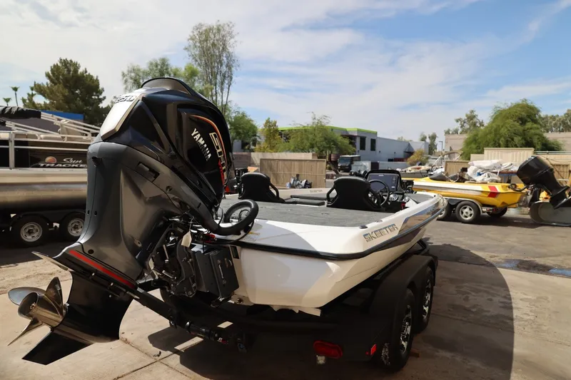 Slide: The Image of 2026 Skeeter ZXR20 SE boat with Yamaha engine in outdoor setting. - 1