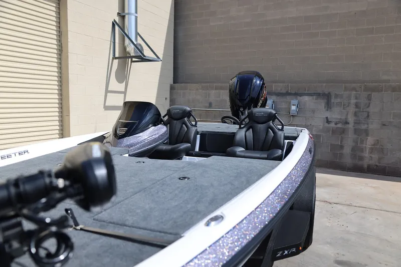 Slide: The Image of 2026 Skeeter ZXR20 SE boat with sleek design and modern seating. - 9