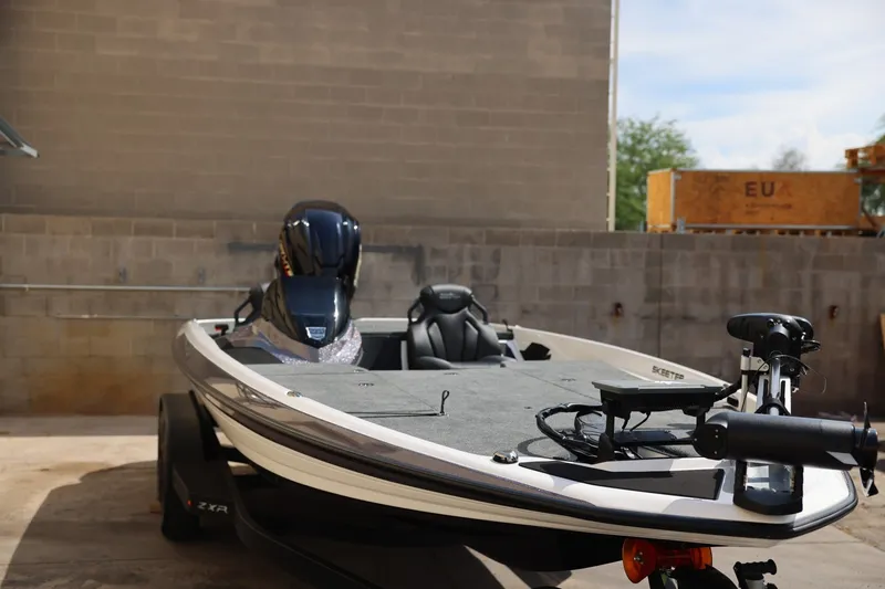 Slide: The Image of 2026 Skeeter ZXR20 SE fishing boat parked in an outdoor area. - 2