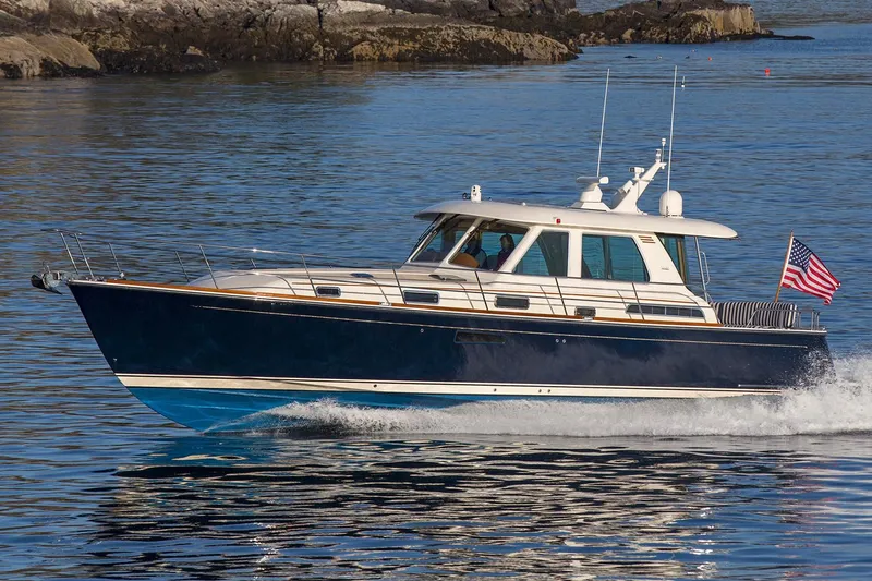 Slide: The Image of Manufacturer Provided Image: 2022 Sabre 48 Salon Express yacht cruising on water. - 58