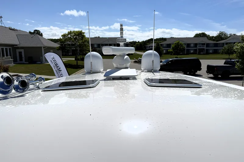 Slide: The Image of Rooftop view of 2022 Sabre 48 Salon Express yacht with antennas and equipment. - 49